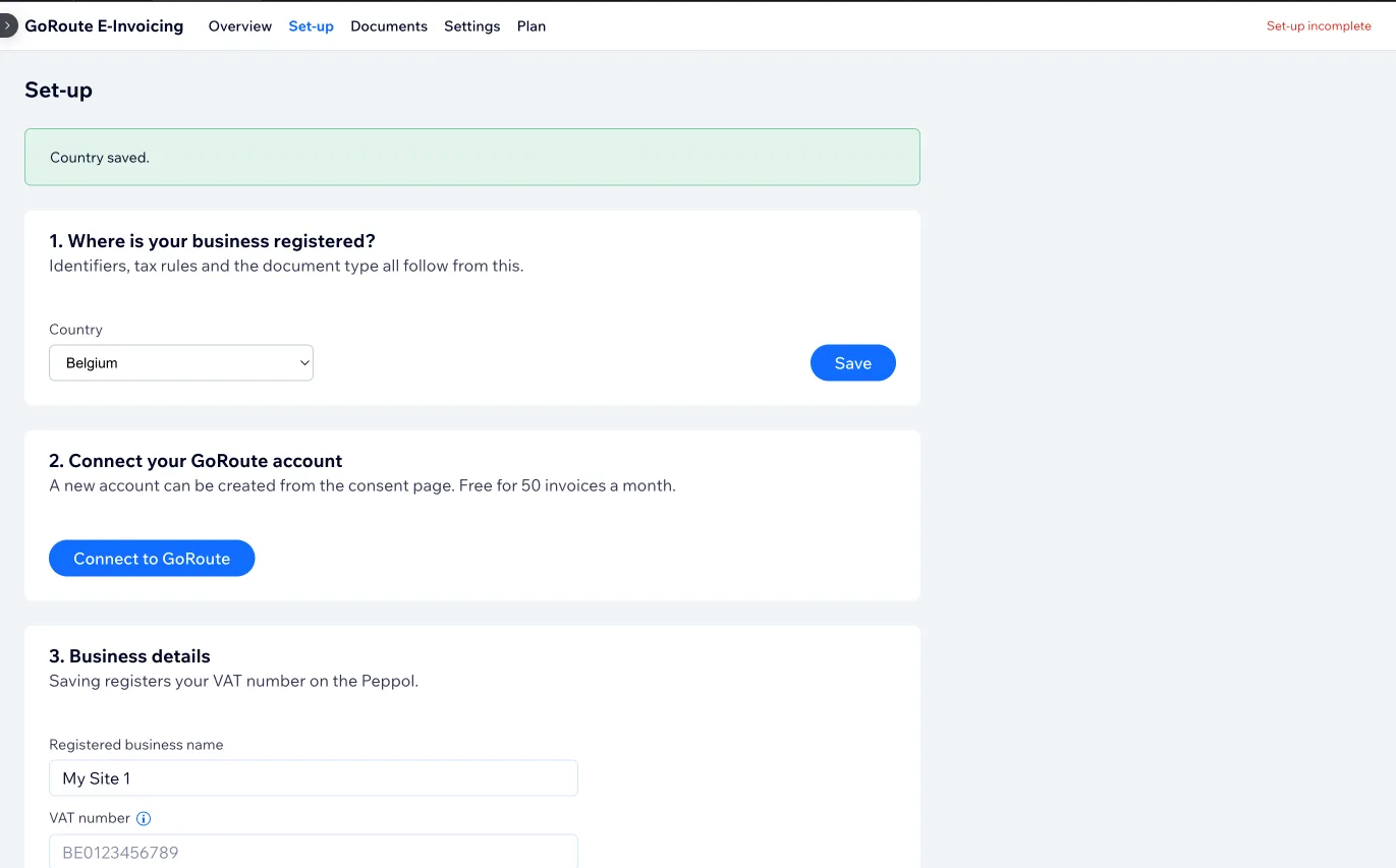 The Set-up page with Belgium chosen as the business country and a Country saved confirmation, with step two Connect your GoRoute account now available and step three asking for the registered business name and VAT number